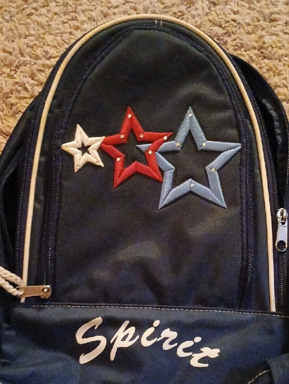 Spirit Navy Backpack with Red, Light Blue and White Star Accents